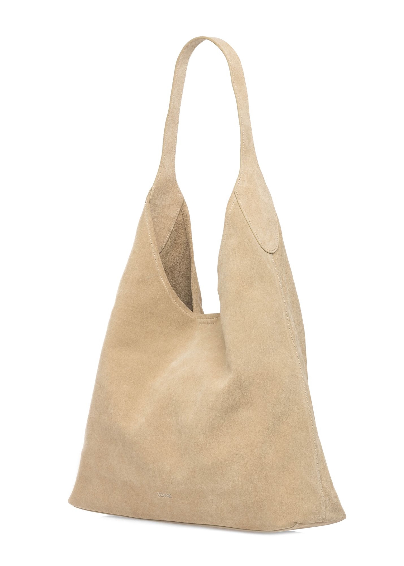 Skórzana torebka shopper w kolorze kremowym TORES-1307-0B(W26) - widok produktu po skosie, na białym tle. 