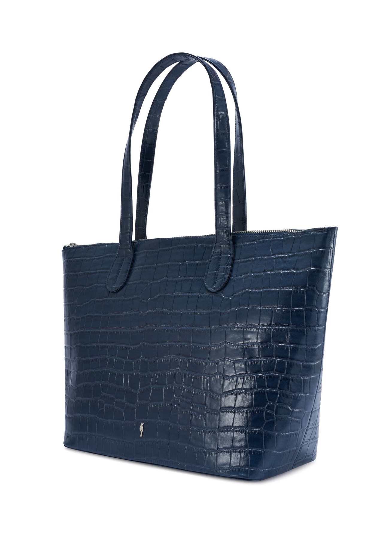 Damska granatowa torebka shopper skórzana TORES-0939F-7D(W26) - widok produktu po skosie, na białym tle. 