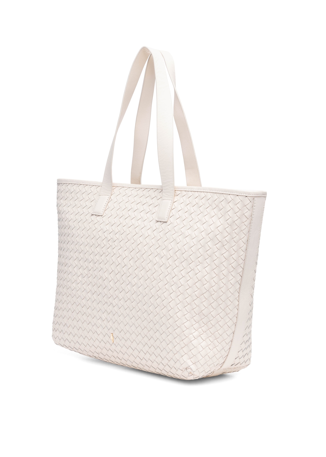Skórzana kremowa torebka shopper damska TORES-1107-12(W25), widok skosu produktu na białym tle.