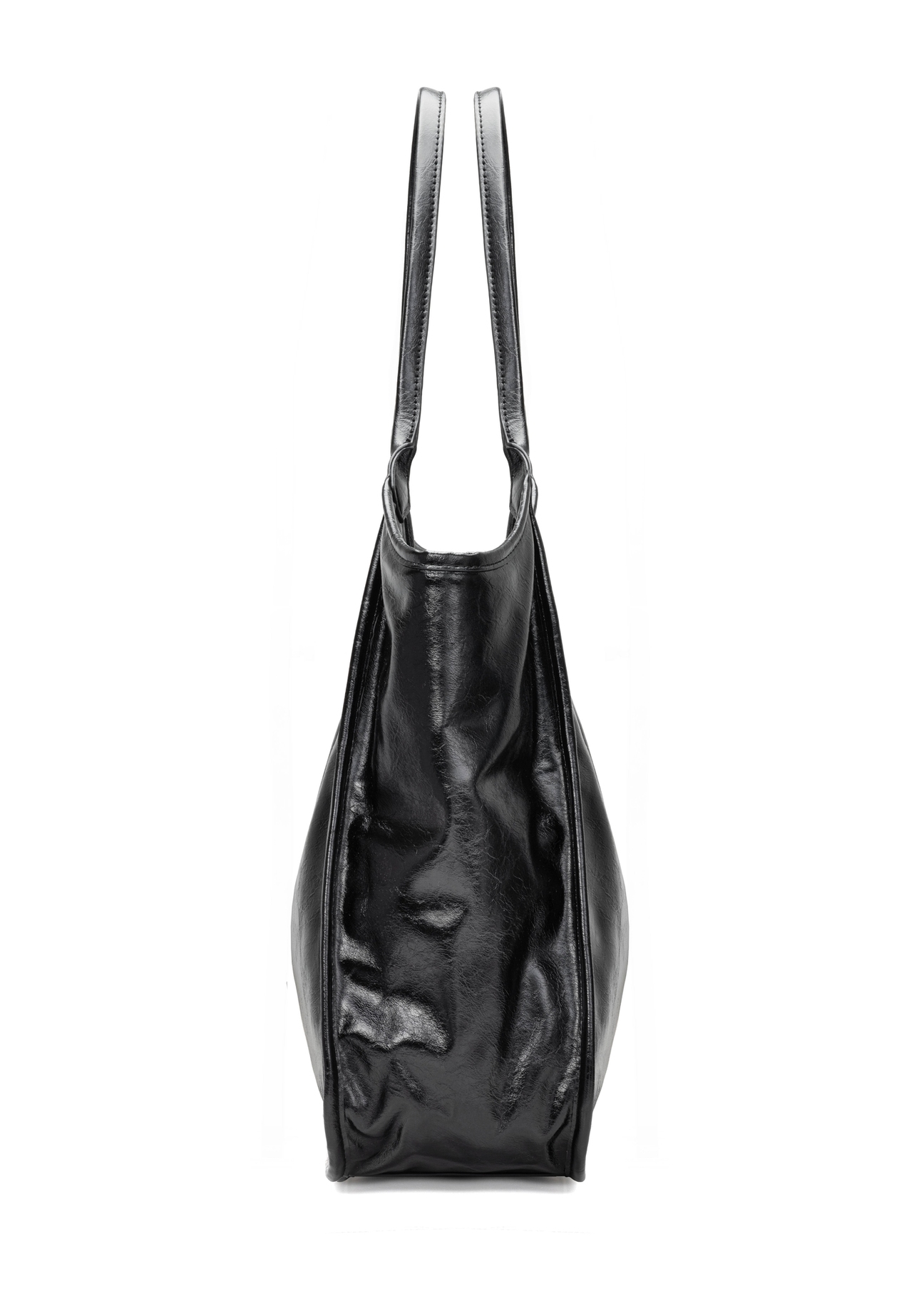 Czarna torebka damska shopper TOREC-1122-9F(W26), widok produktu z boku na białym tle.