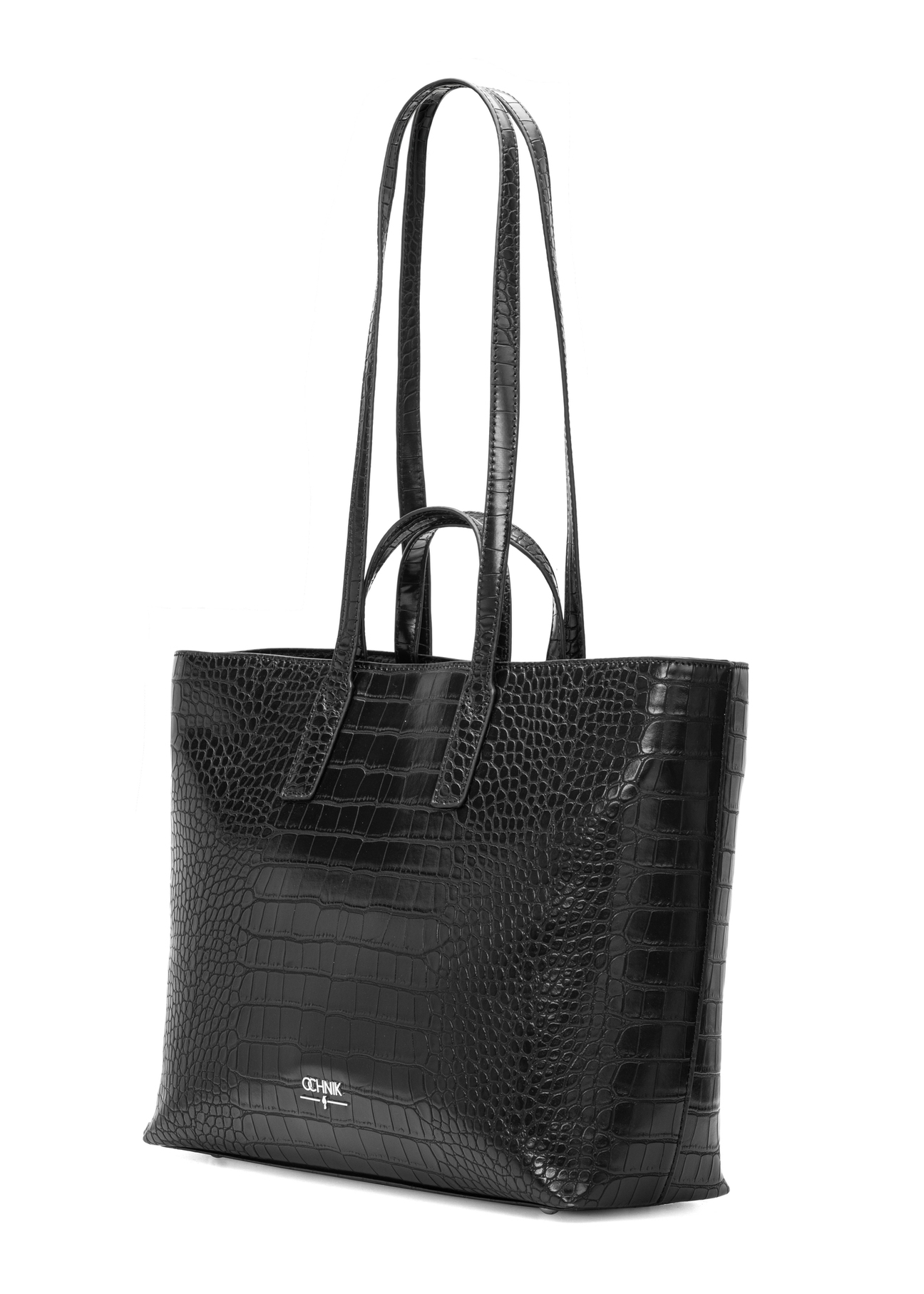 Czarna torebka damska shopper TOREC-1204-9G(W26), widok produktu skosem na białym tle.